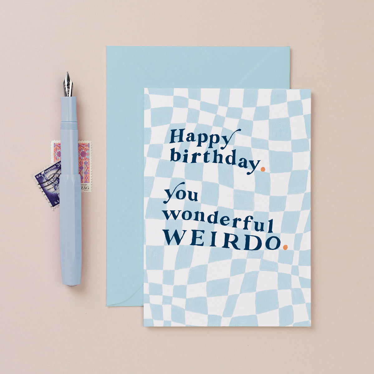 A checkerboard pattern card with wonderful weirdo hand lettering on a birthday card from the birthday card collection at Sister Paper Co.