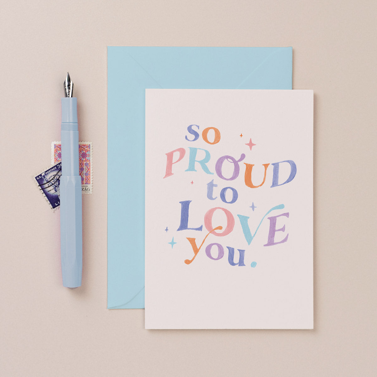 A thinking of you card with sending you a rainbow lettering on a thoughtful card from the thinking of you card collection at Sister Paper Co.