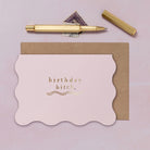 A birthday card featuring luxe stamped gold foil details from the Cosmique range of greeting cards from Sister Paper Co.