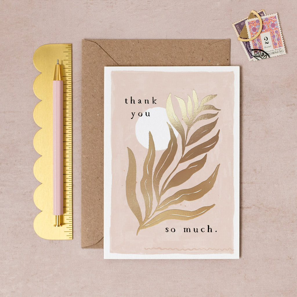 A thank you card with golden leaf details from Sister Paper Co.