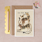 A leopard new baby card with gold foil details from Sister Paper Co.