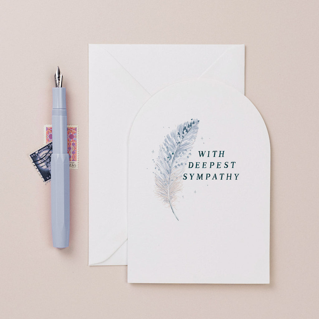 A sympathy card featuring a feather from Sister Paper Co.
