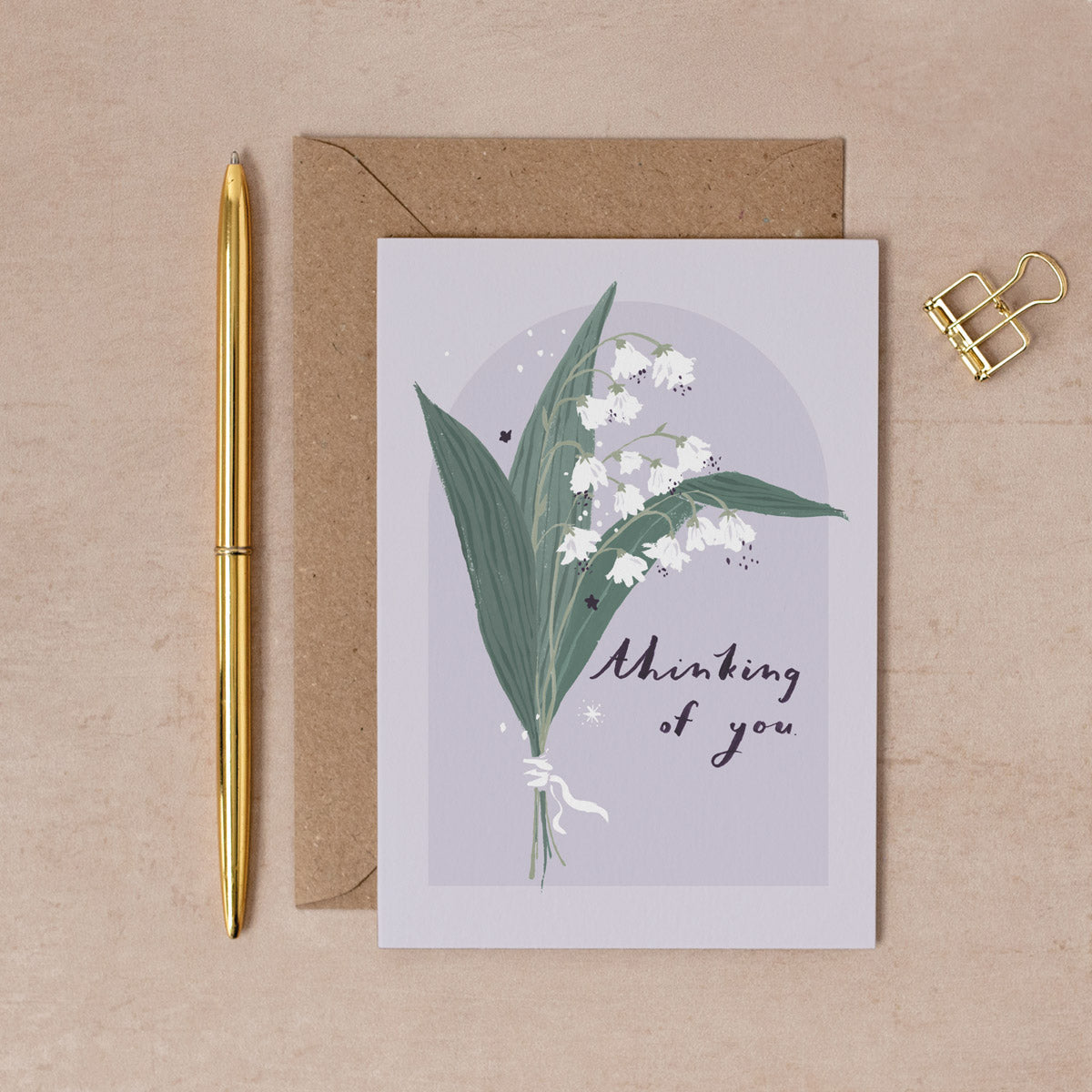 A Thinking Of You card with hand-painted Lily of the Valley flowers. From the Solstice collection at Sister Paper Co.