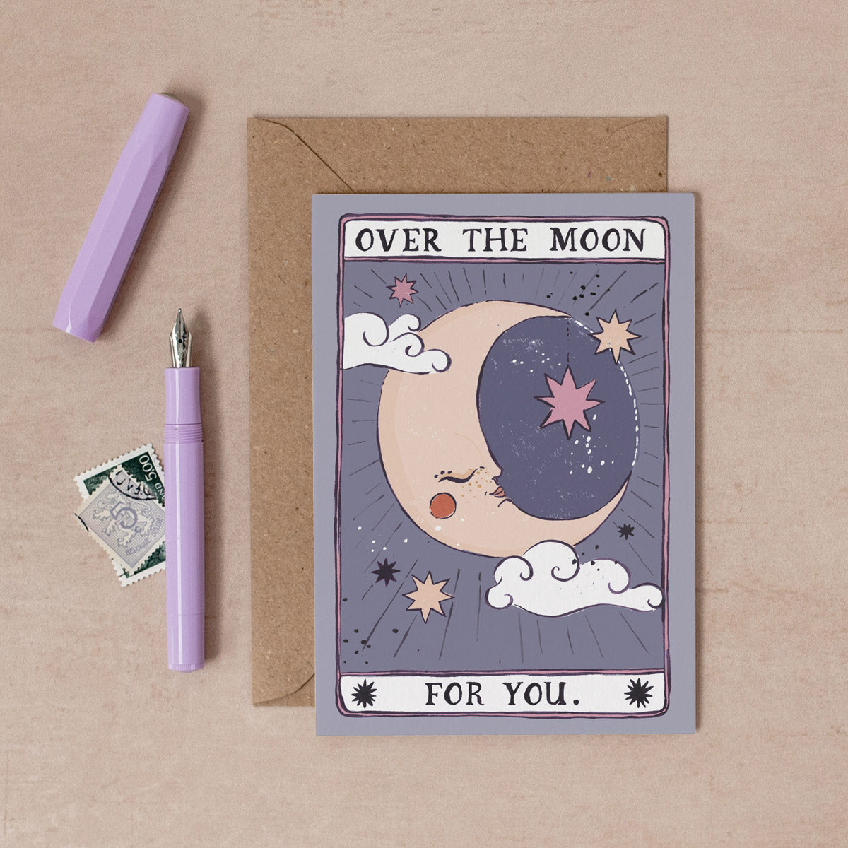 A handmade congratulations card with illustrated moon and over the moon for you hand lettering on a congrats card from the tarot celebrations collection at Sister Paper Co.