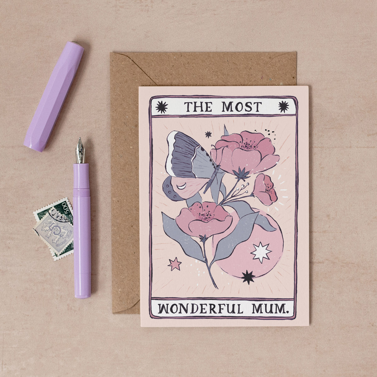 A hand painted mum card featuring flowers and butterflies in a tarot-inspired design. Reads "The most wonderful mum". From the Tarot Collection at Sister Paper co.