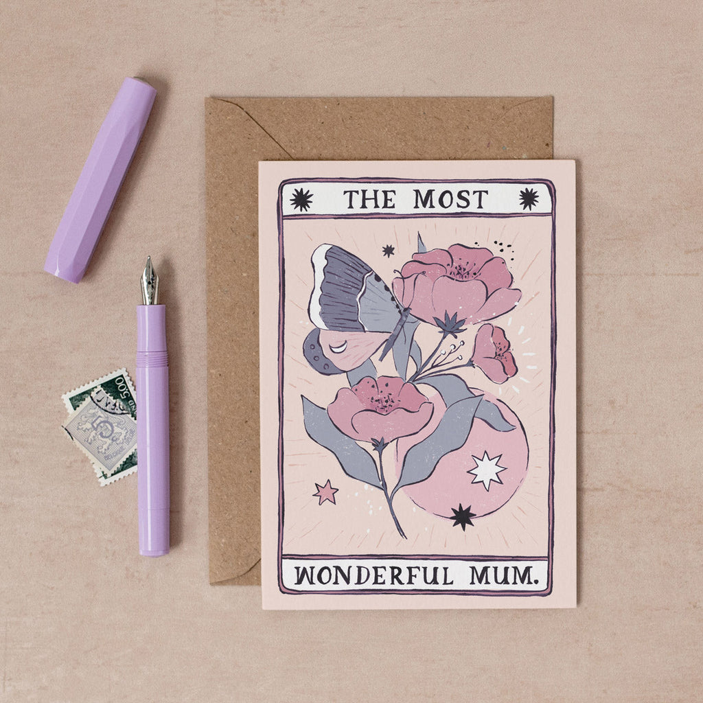 A hand painted mum card featuring flowers and butterflies in a tarot-inspired design. Reads "The most wonderful mum". From the Tarot Collection at Sister Paper co.