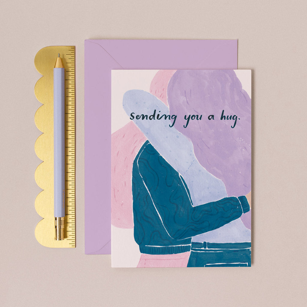 A pair of hugging friends on thinking of you card from the female card collection at Sister Paper Co.